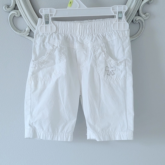 White Bermuda Shorts with Bow Detail and Ruffle Pockets - Picture 1 of 2